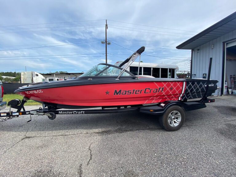 High-quality vinyl wrap applied to boat exterior for long-lasting visual enhancement