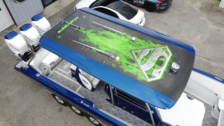 Marine wrap process highlighting clean installation on boat’s exterior panels