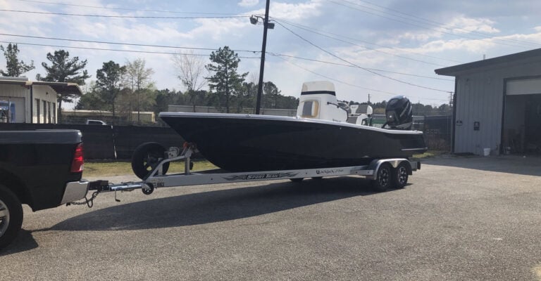 Parallax-style boat wrap image featuring layered marine design elements