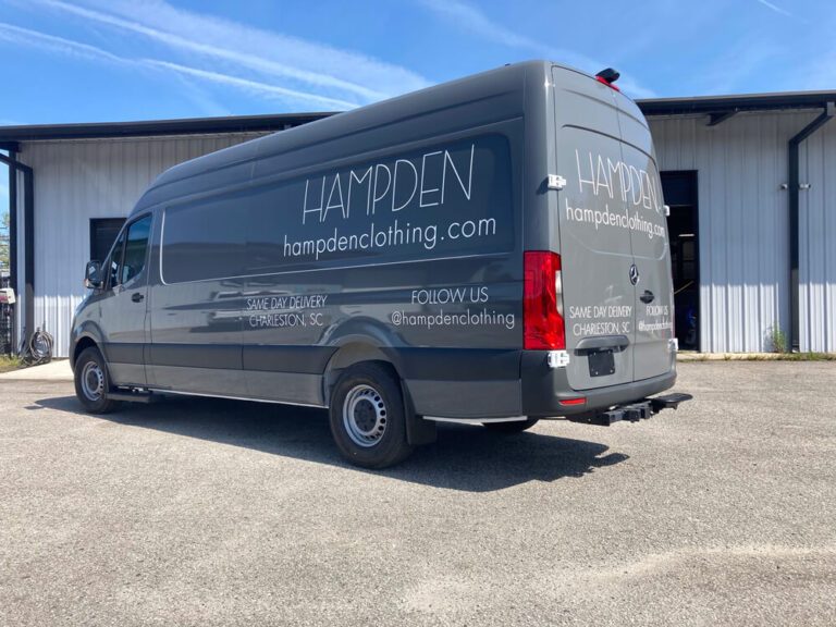 Custom vinyl lettering installation adding clean branding to surface areas