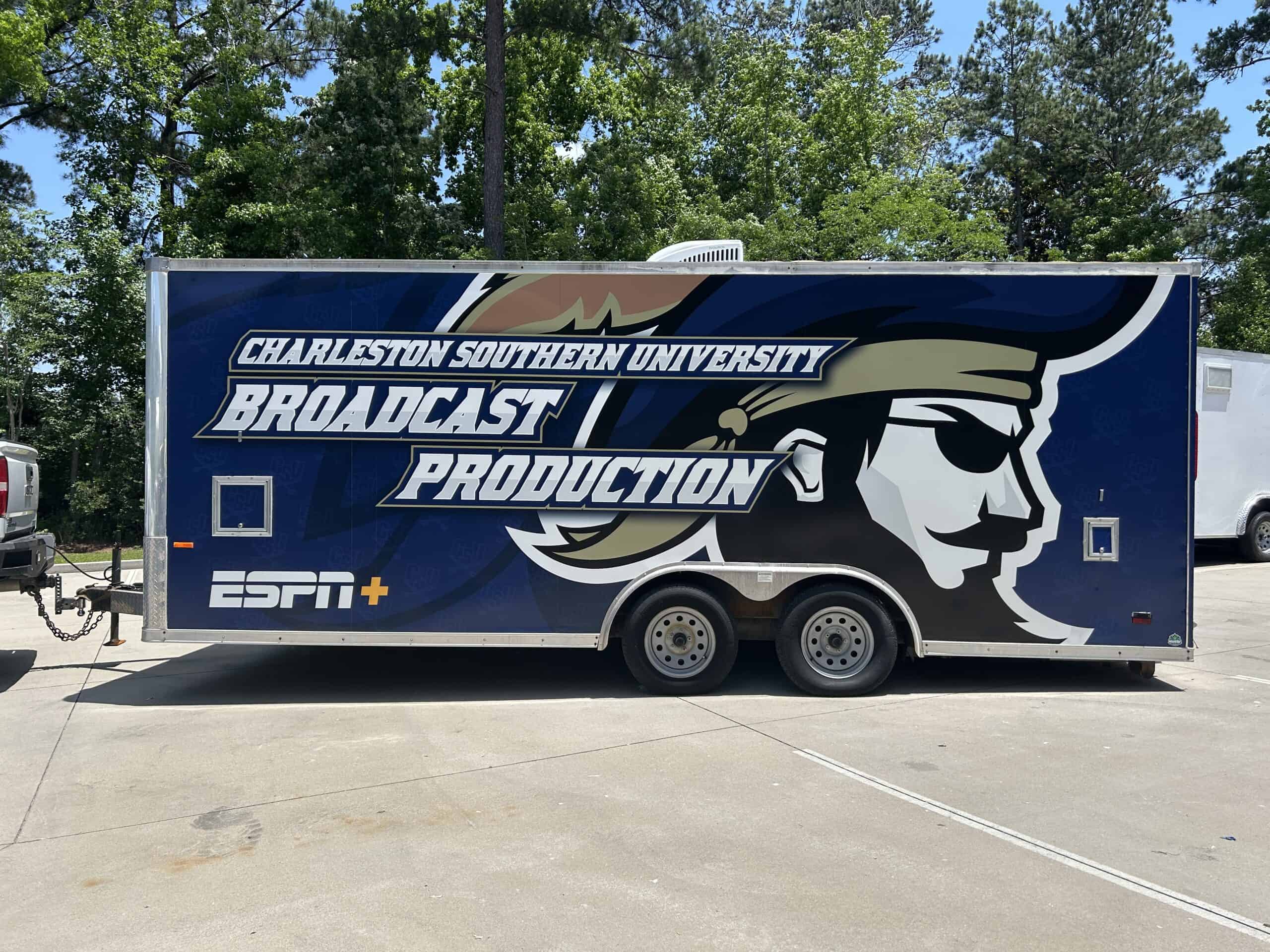 High-quality vehicle wrap for Charleston Southern University promoting campus pride.