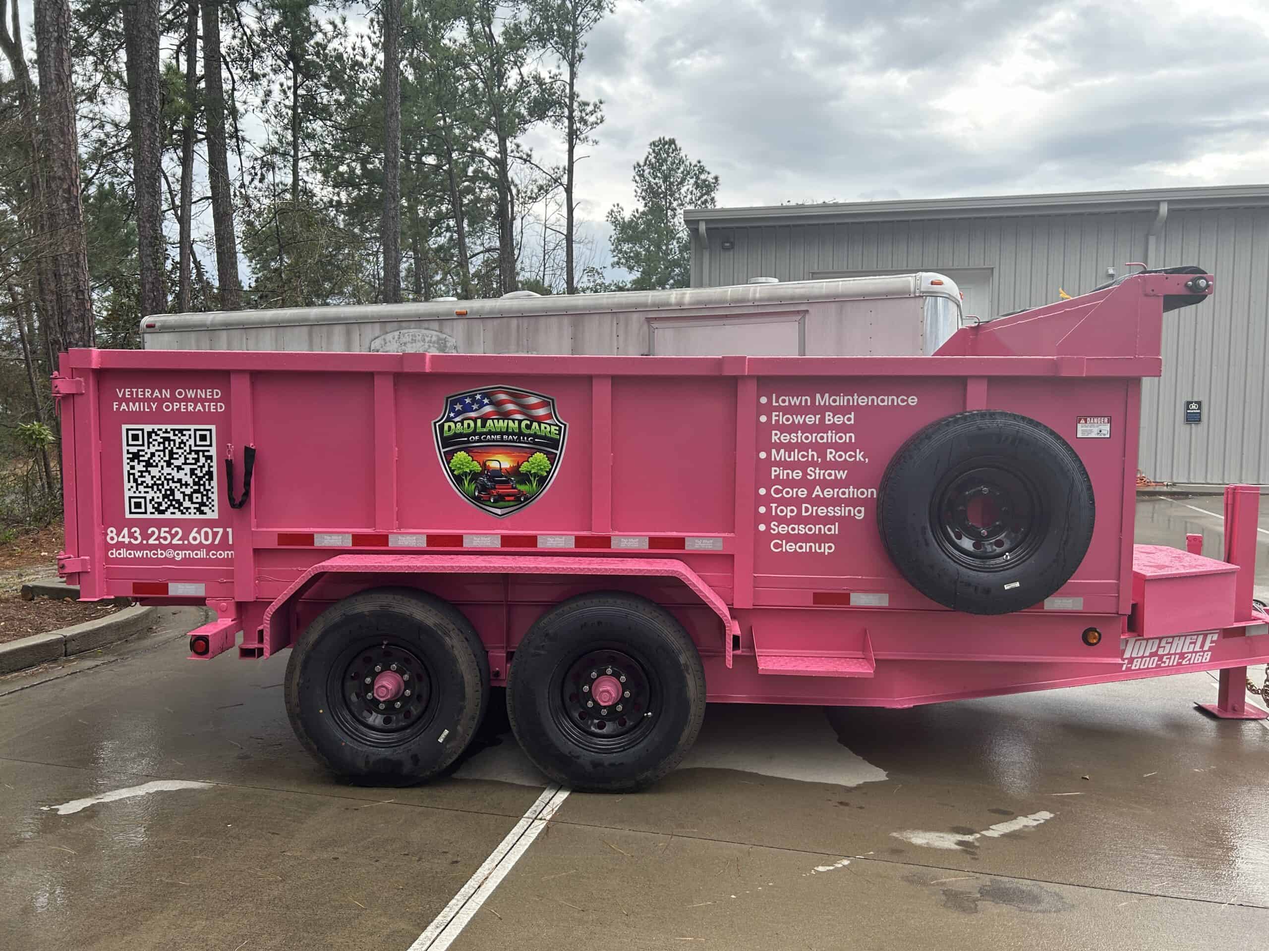 Custom pink commercial vehicle wrap for advertising and branding.