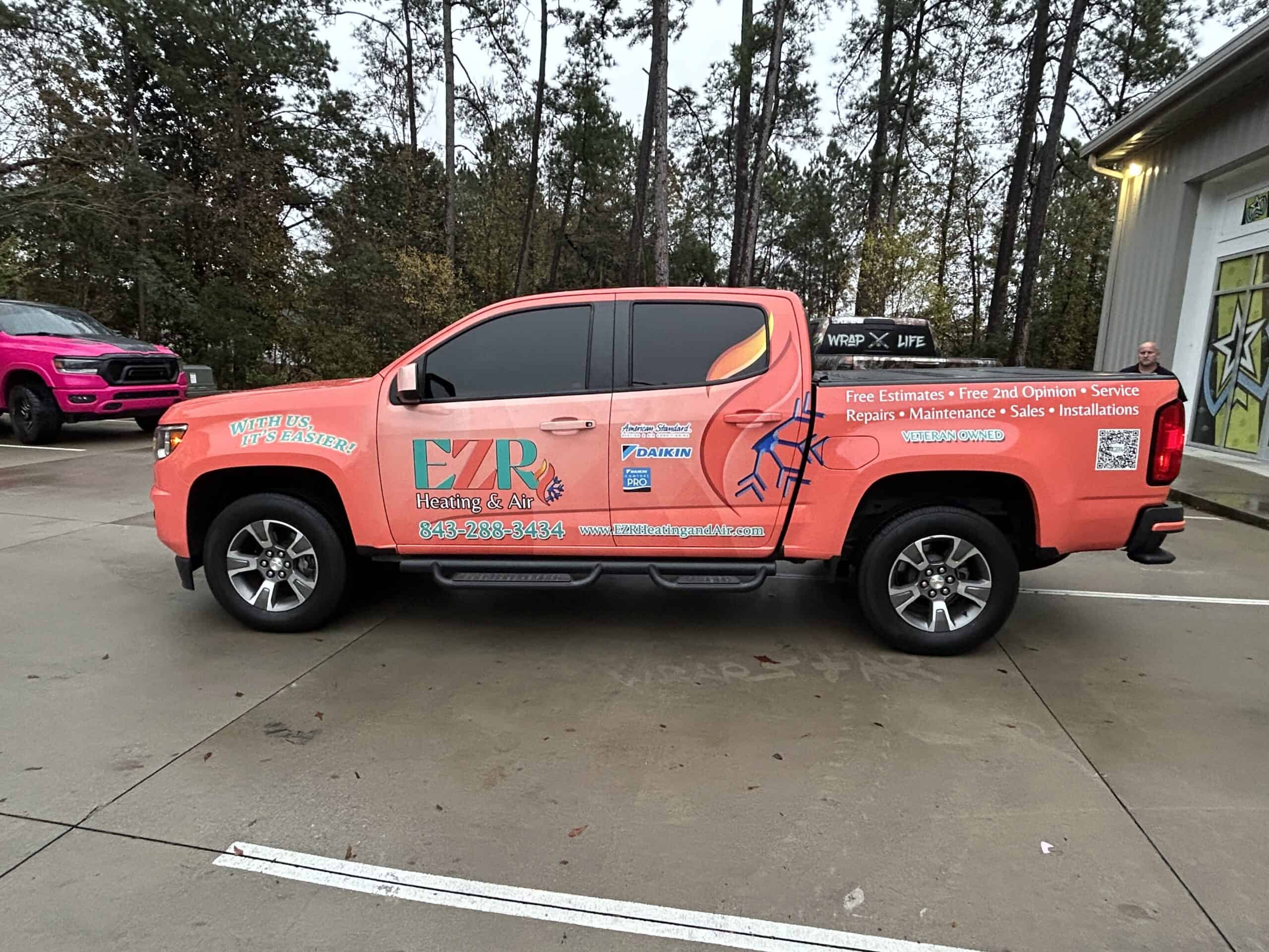 Vehicle wrap on a pickup truck showcasing Wrapstar Charleston's custom commercial vehicle wraps serv.