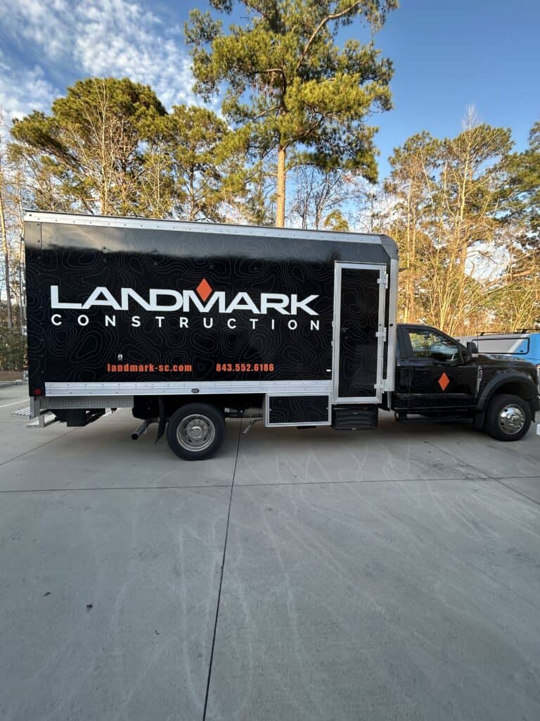Landmark Construction truck wrap in Charleston for commercial vehicle branding. Expert vehicle wraps.