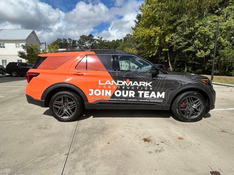 Landmark Construction vehicle wrap for marketing.