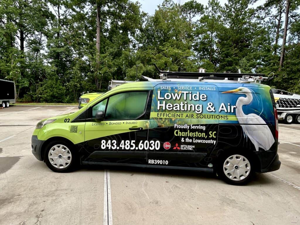 Low Tide Heating & Air vehicle wrap for commercial branding.