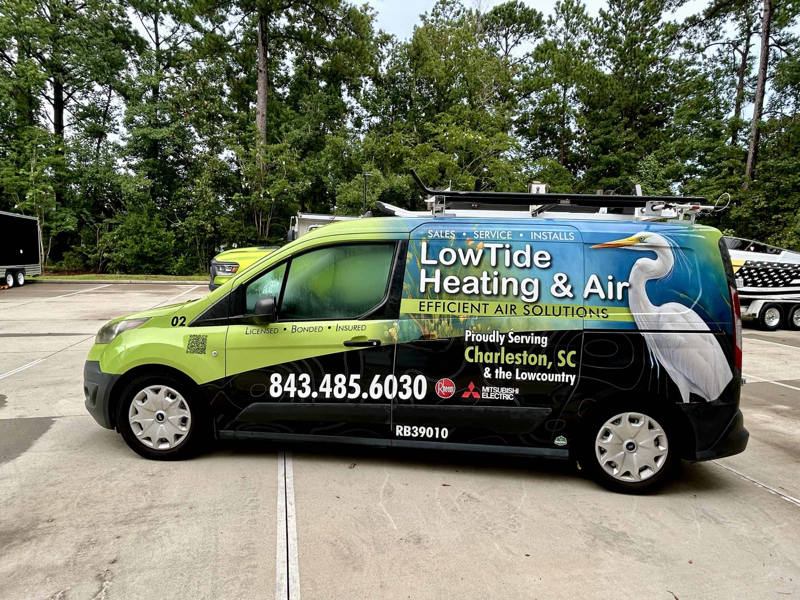 Low Tide Heating & Air vehicle wrap for commercial branding.