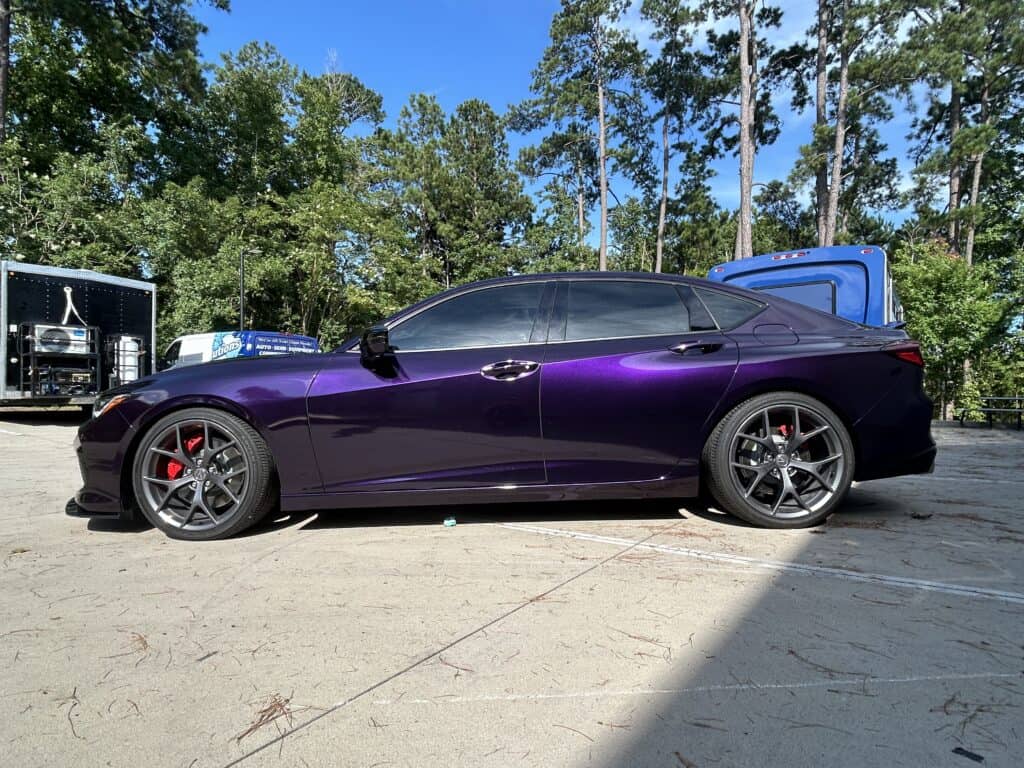 Vehicle wrap for a sleek purple sports car in Charleston.