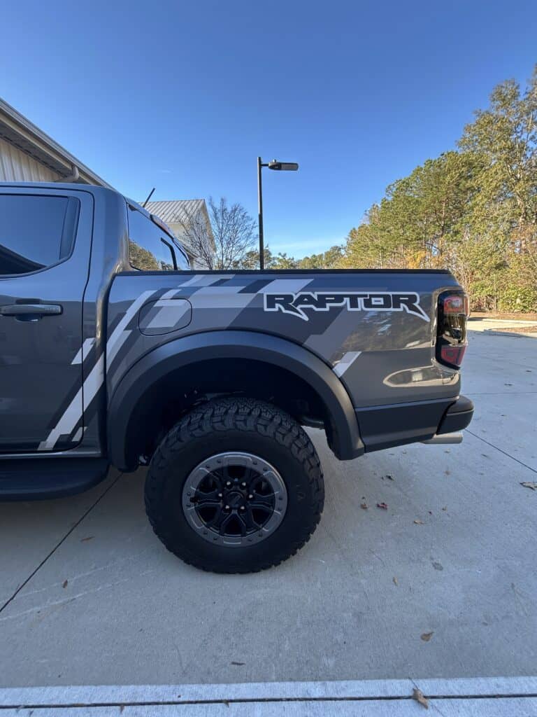 Custom Raptor truck wrap in Charleston for commercial branding and advertising.