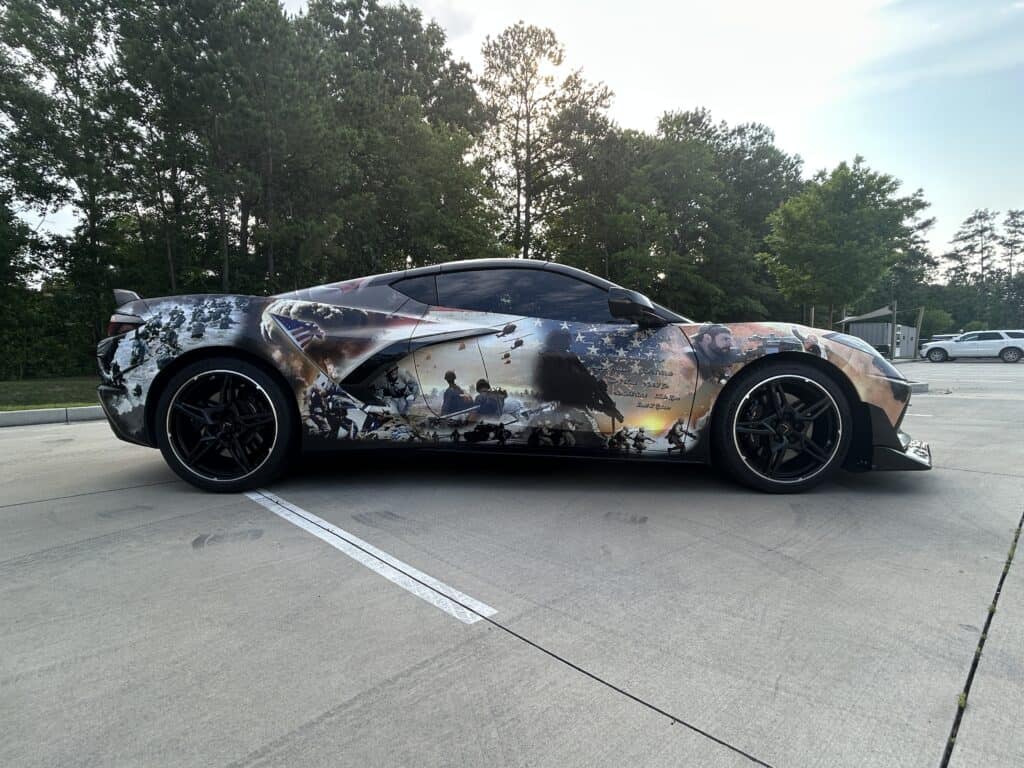 Vehicle wrap featuring patriotic American flag design.