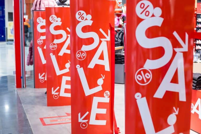 Custom signs and banners by Wrapstar Charleston for promotional displays.