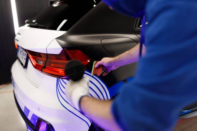 Custom vehicle wrap being applied to a car at Wrapstar Charleston.