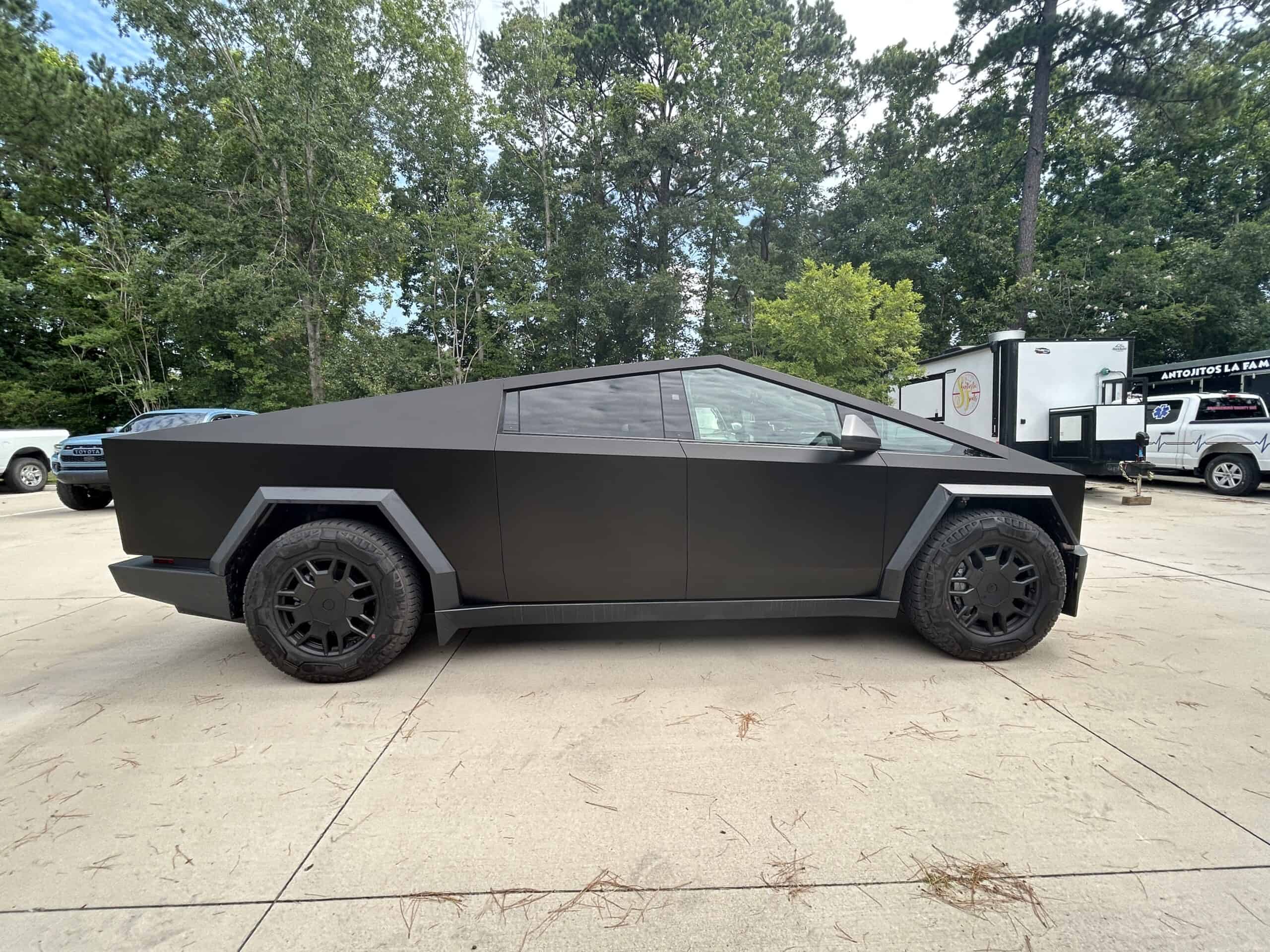 Tesla Cybertruck with matte black vehicle wrap in Charleston.